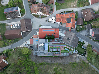 Aerial view of the Sternwirt country and wellness hotel in Högen