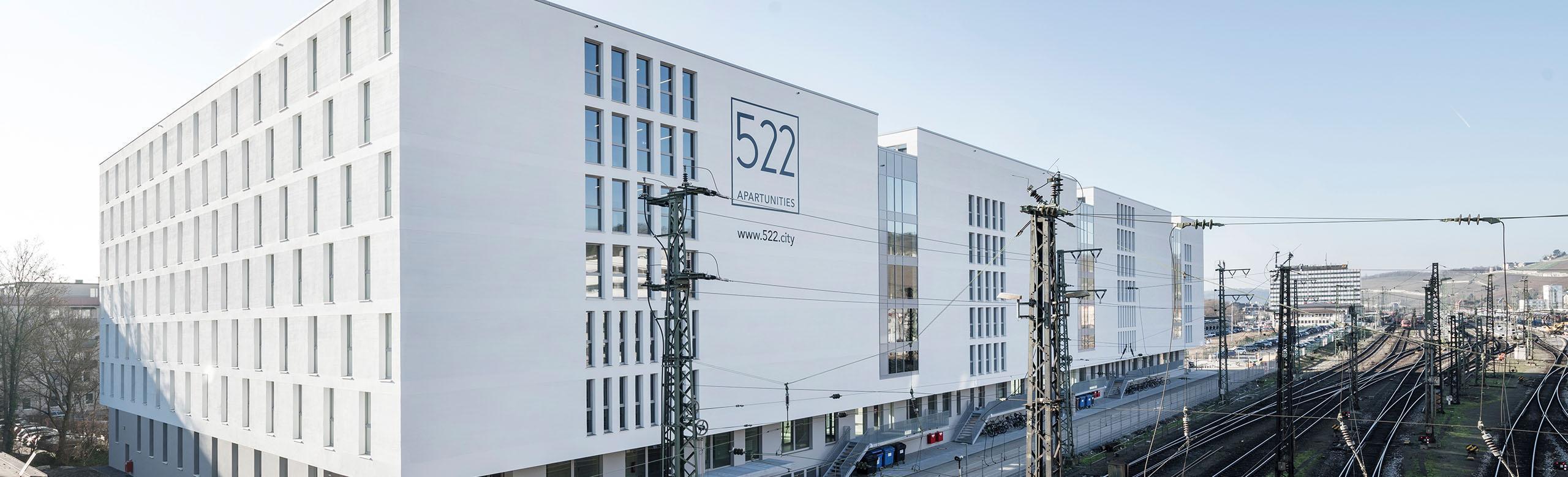 In Würzburg, student residence 522 is located directly next to the railway infrastructure.
