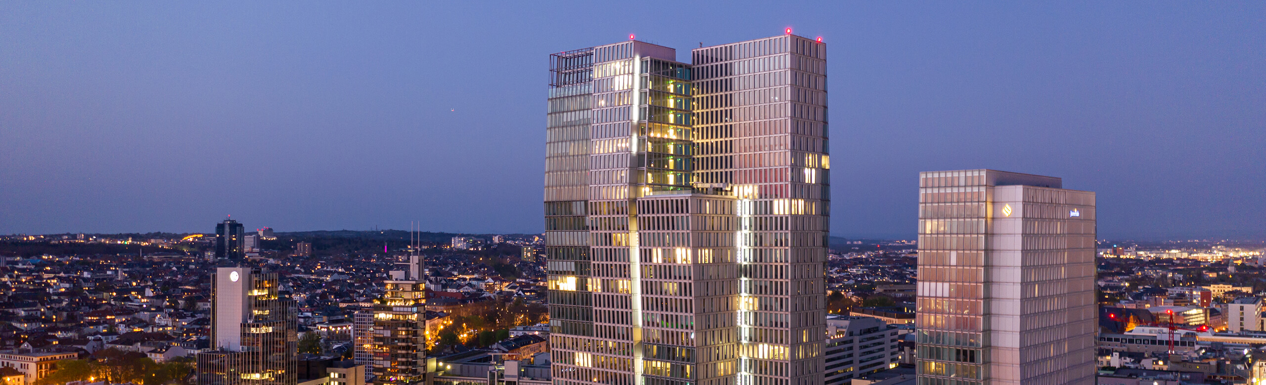 Frankfurt skyline with the Palais Quartier at night.